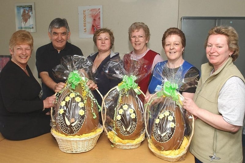 Hospice Easter appeal at Redcats Horbury Road depot. L to R Daniela Vernon receiving easter egg to raffle from Terry Rigg of Wakefield Hospice. With raffle ticket buyers June Parkin, Christine Pate, June Hall, Karen Marsden.
