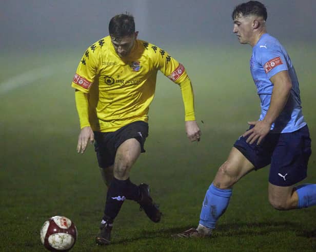 Ossett United's Luke Hogg up against Pontefract Collieries' Gavin Rothery last season when he won two of the club's player of the year awards.