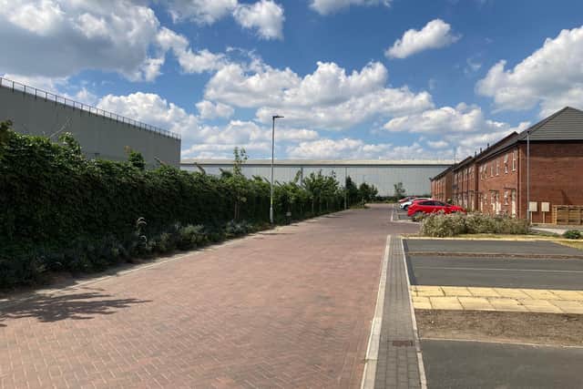 Residents living next to a site planned for a major commercial warehouse have objected to it being in operation 24 hours a day.