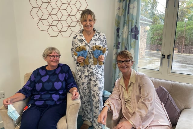 Wakefield Hospice care staff Sue, Cathryn and Janet in their pjs and dressing gowns.