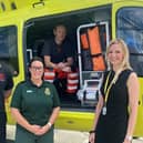 R Manager Laura Wilson with Yorkshire Air Ambulance, Armed Forces veterans, Pilot, Owen McTeggart (left), Paramedic, Fiona Blaylock (Middle), Paramedic Andrew Armitage (Inside Helicopter).