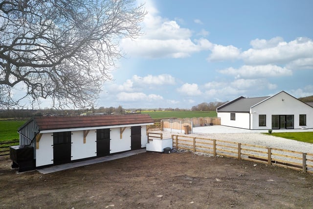 The bungalow has a stable and paddock as part of its outdoor facilities.