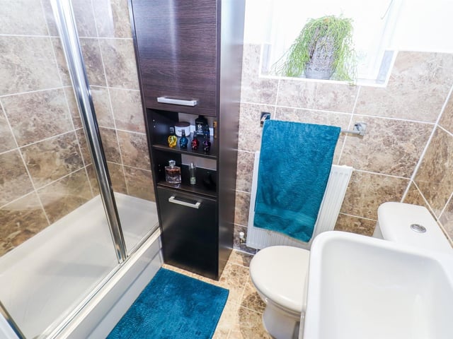 One of the bathroom facilities within the house.