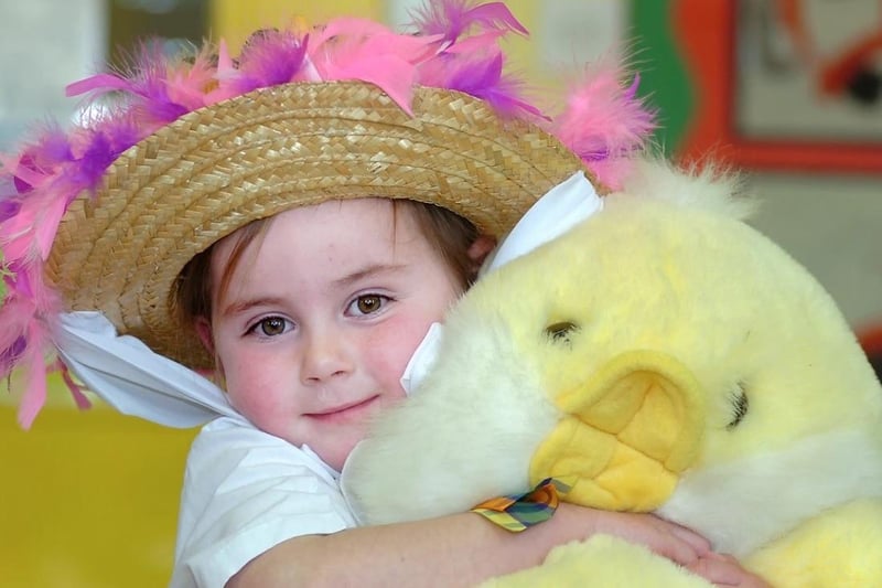 Easter bonnets at Lee Brigg Infants school, Altofts. Picture shows Erin Hodgkiss with a giant fluffy chick.