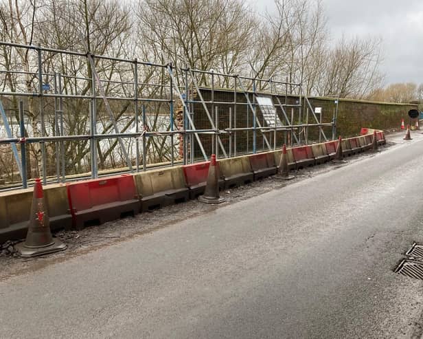 Wakefield Council has confirmed that temporary traffic lights will be in place until at least May while repairs continue to a historic bridge on Doncaster Road.