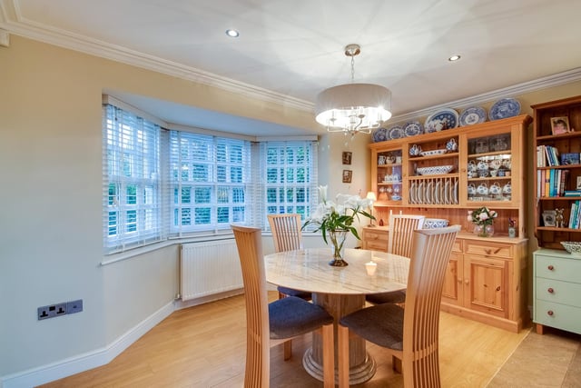 The ground floor dining area with front bay window is light and spacious.