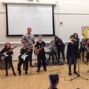 Rocksteady Music School paid pupils a visit, performing well-known songs and giving children the chance to have a go at instruments for themselves in a series of workshops.