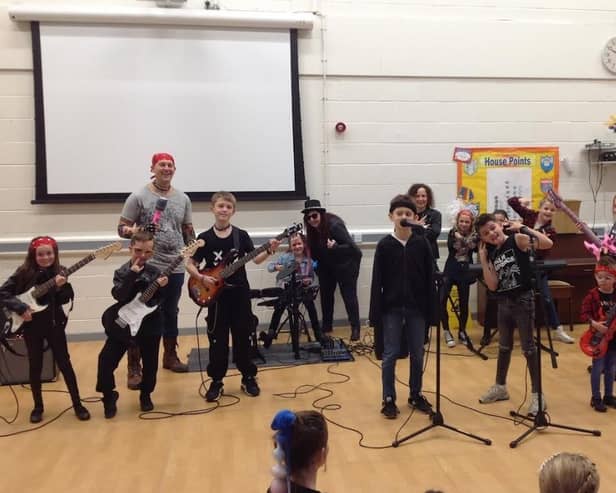 Rocksteady Music School paid pupils a visit, performing well-known songs and giving children the chance to have a go at instruments for themselves in a series of workshops.