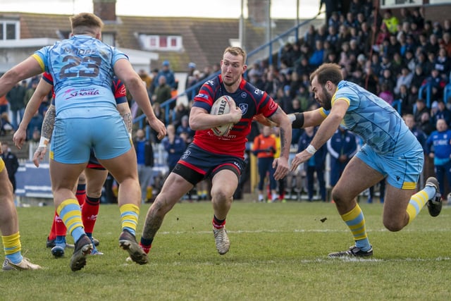 Josh Hardcastle on the attack for Featherstone Rovers.