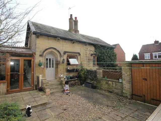 This impressive conversion of an 18th century gatehouse is for sale at £335,000.