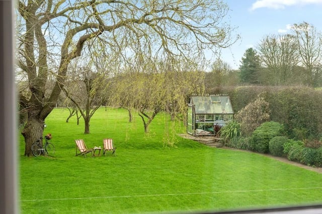 The large landscaped garden offers complete privacy.