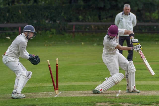 Methley's Alex Cree is bowled by Tom Brook after making 25.