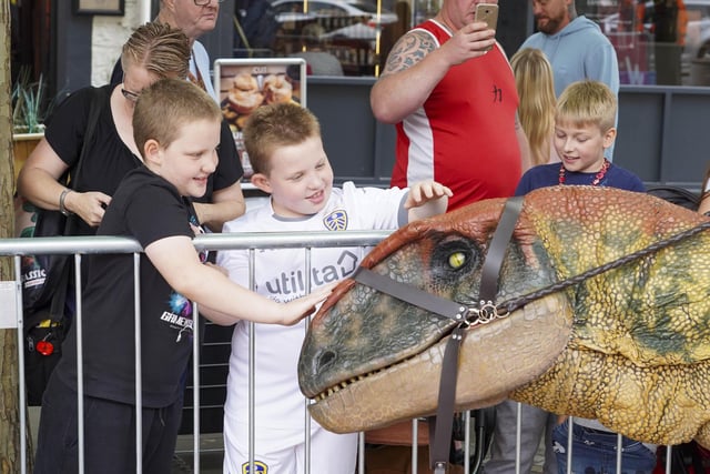 Children got to to pet the creatures from Jurassic times.