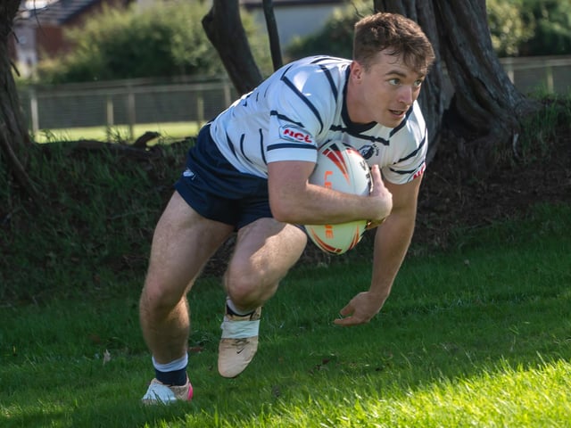 Elliott Bell scores a second half try to put Featherstone Lions back in control at Barrow Island.