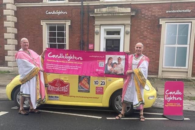 Roman holiday: The toga-wearing pair will be driving to Monte Carlo via Turin in Italy in a Volkswagen Beetle that Rick restored for less than £500.