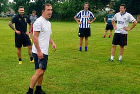 Wakefield Athletic coach Davy Jones organising group drills at a training session.