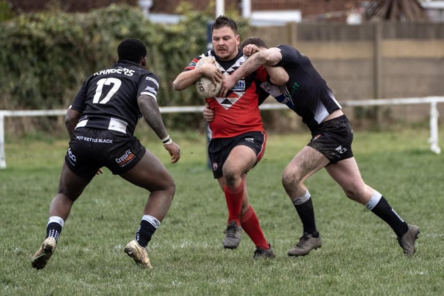 Connor Wilson on a determined run for Normanton Knights.