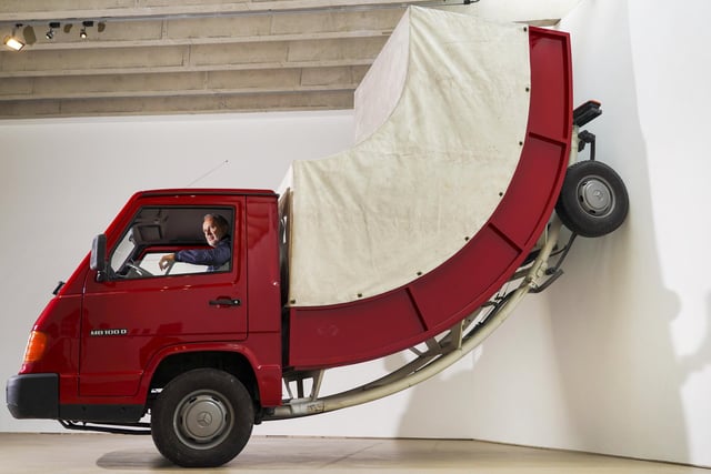 Austrian artist Erwin Wurm with his work 'Truck II' (2011).