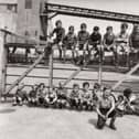 Children sitting on the railway gate at Fryston Colliery, 1940-1955