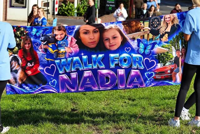 A banner at the Walk for Nadia event