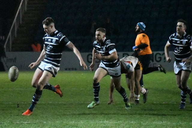 Riley Dean puts a kick in to get Featherstone Rovers downfield.