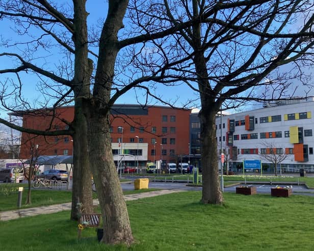 Plans to fell trees in the grounds of Pinderfields Hospital have been scaled back after health chiefs were accused of an 'overly cautious' approach to health and safety.