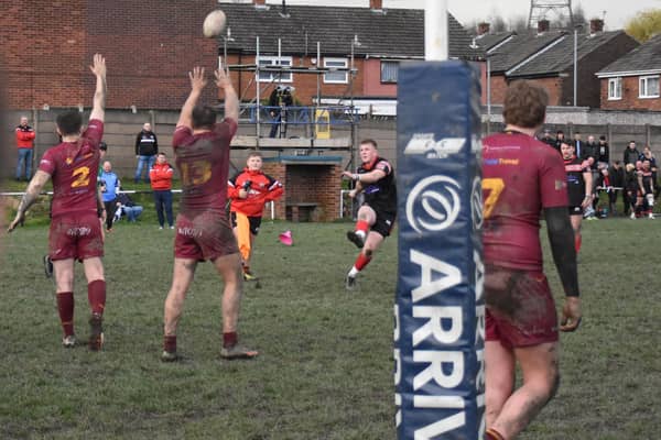 Charlie Barker lands a kick to clinch Normanton Knights' victory over Dewsbury Moor Maroons. Picture: Rob Hare