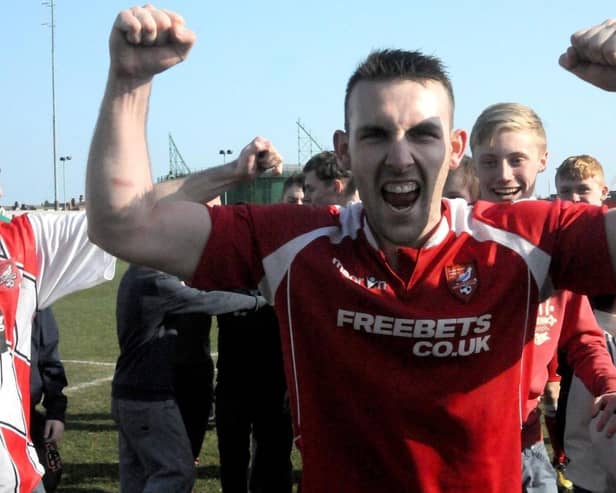 Paddy Miller celebrates one of his promotions when a Scarborough Athletic player.