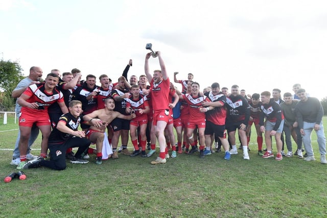 Fryston Warriors A captain Corey Southern lifts the Edgar Hanson Trophy after victory over Featherstone Lions in the Castleford & Featherstone District Cup final. Picture: Matthew Merrick