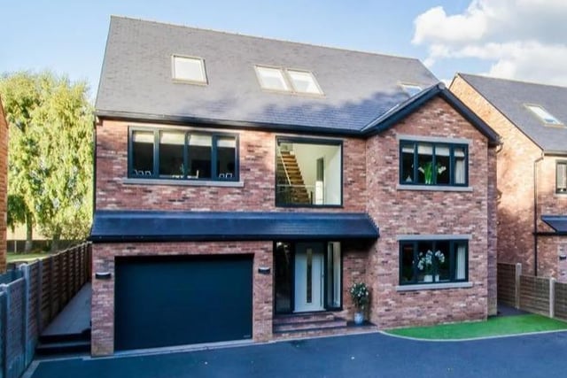 This 7 bed detached house is on Hill Top Road, Newmillerdam. Briefly comprises reception hall, living room, cloakroom, bespoke open plan kitchen/dining/living room with a dining area off, utility room and downstairs wc, contemporary floating staircase leading to the first floor galleried landing which leads to four double bedrooms, three with luxurious en suite shower rooms. It's for sale for £1,300,000.