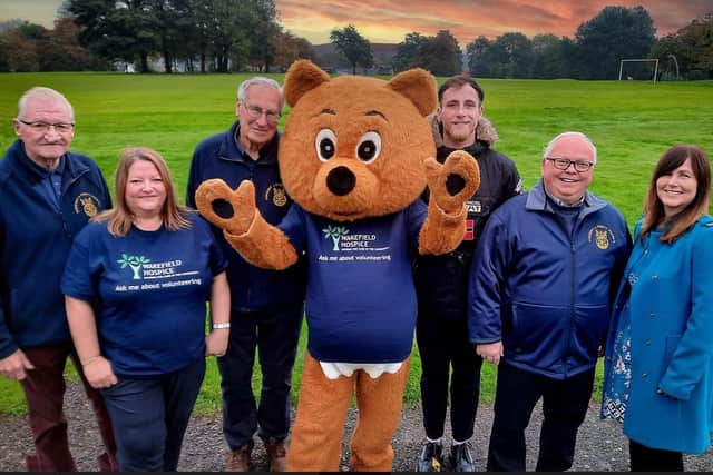 (Left to Right): Jonathan Siddall, Keeley Harrison (Head of Fundraising at Wakefield Hospice), Mike Rogers (Chair of The Rotary Club of Horbury & Ossett Phoenix), Treacle Bear
(Wakefield Hospice Mascot), Alex Cunniff (Events Fundraiser at Wakefield Hospice), John Faulkner (Chair of The Horbury Show) and Theresa Barrett (Individual Giving Fundraiser at Wakefield Hospice).