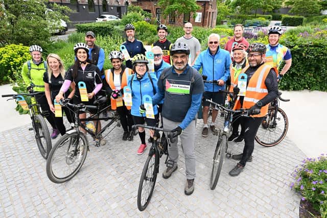 On your bike: Wakefield councillor Mohammad Ayub with members of Cycle Wakefield.