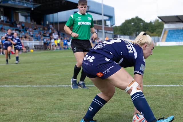 Chloe Billington touches the ball down for a try  for Featherstone Rovers Ladies against Barrow Ladies. Picture: John Victor