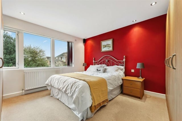Unlike other properties, the ground level of this home presents a versatile single bedroom or dressing room, alongside three further sizable bedrooms.