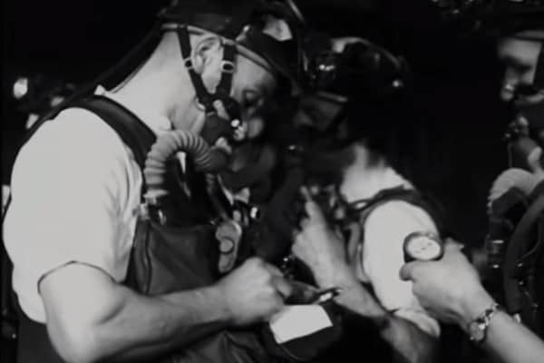 This fascinating newsreel film shows mine rescuers carrying out an emergency drill exercise in a Wakefield pit.