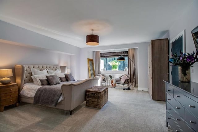 The first bedroom features UPVC double glazed window overlooking the front elevation, central heating radiator and mood lighting surrounding the seating area.