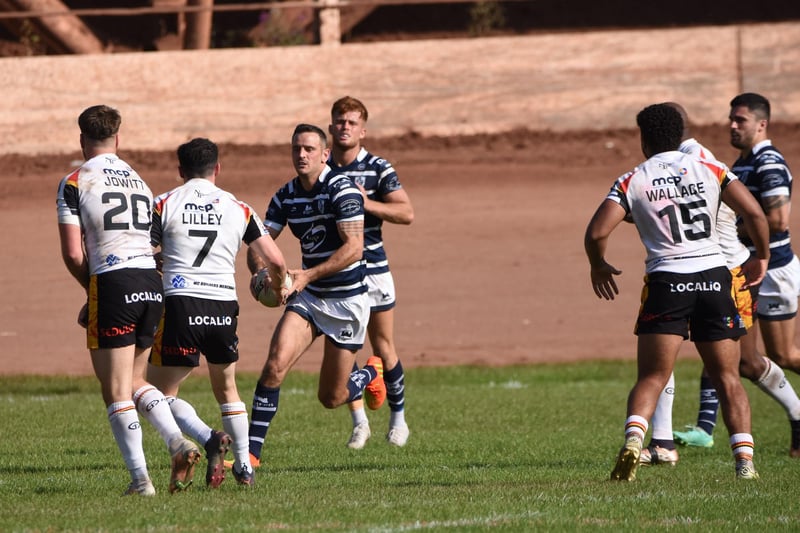 Craig Hall runs the ball out for Featherstone Rovers.