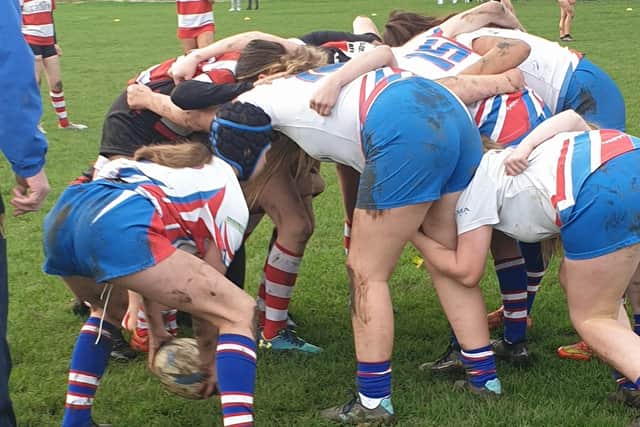Castleford RUFC Girls U14s scrum down in their game against Cleckheaton.