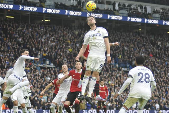 Patrick Bamford tries to get a header in for Leeds United.
