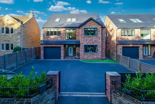 This seven bedroom detached home on Hill Top Road, Newmillerdam, is available for £1,095,000.