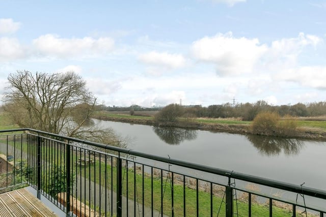 A view of the River Calder from the property's first floor balcony.