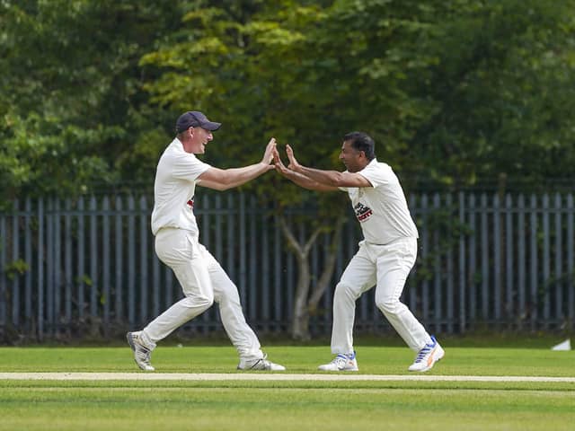 Chamila Wijesinghe celebrates taking the first wicket for Streethouse against Oulton. Photo by Scott Merrylees