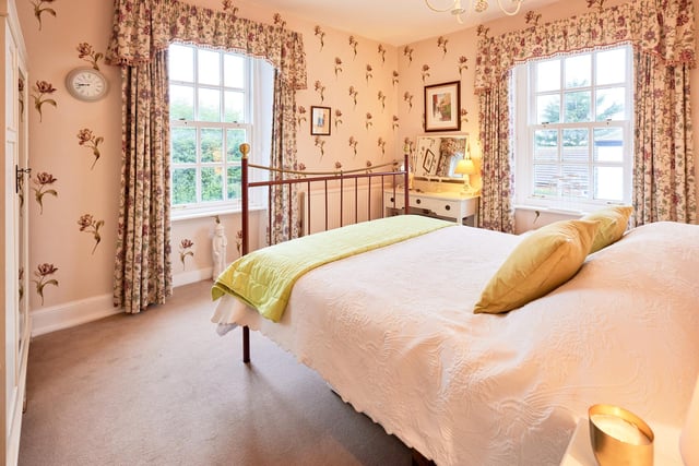 Another bright and spacious bedroom, with double aspect windows.