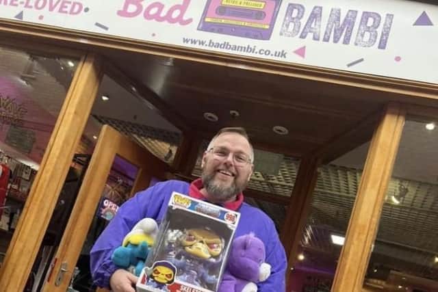 Marc Williamson with some of the products the Castleford shop stocks, which ranges from retro clothing to vinyls to collectibles