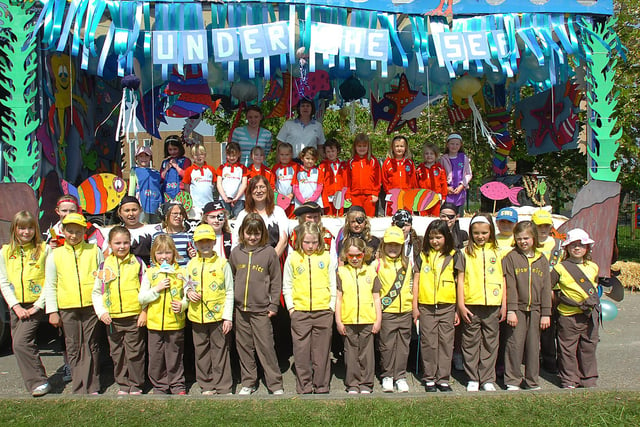 The Ossett District Girl Guides stand for a picture during the 2007 Gawthorpe Maypole Procession.