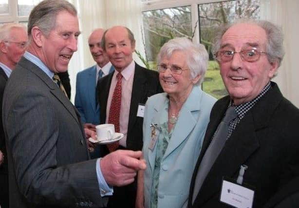 23 years after their first meeting at her home, Gretta Sharkey, original co-ordinator of support groups, jokes with HRH The Prince of Wales on his visit to the Hospice