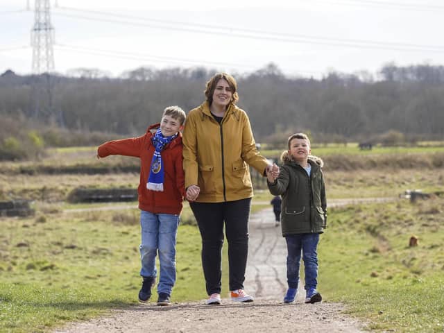 Jasmine Barnett and her sons Sam and Harry is organising a charity walk. Picture Scott Merrylees