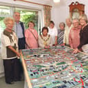 The then Mayor of Wakefield, Janet Holmes (seated), with the Horbury Tapestry and some of the stitchers. (Left to right) Janet Taylor, Geoff and Sylvia Spiller, Molly Partinton, Olive Sargeant, Gladys Spell, Pat Bradley, Hilary Elstone, Yvonne Townsend, Eileen Brewer, pictured in 2004. Picture: Peter Vickers