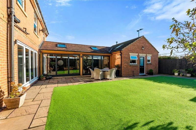 Stepping outside you are greeted by a low maintenance Southerly facing garden which is ideal for alfresco dining.