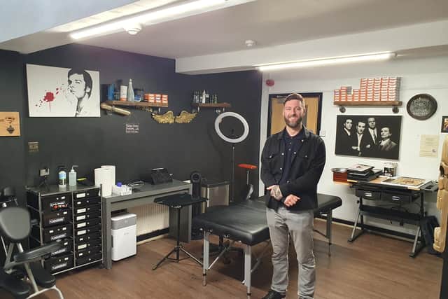 Danny Tymon pictured in one of the tattoo studios